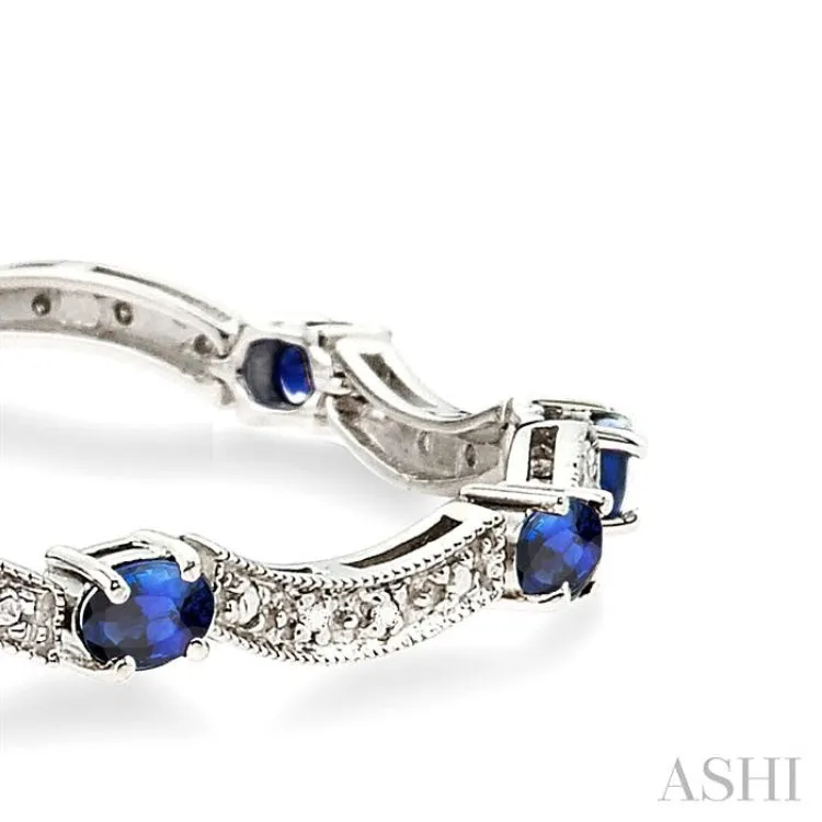 4x3mm Oval Cut Sapphire and 1/10 Ctw Single Cut Diamond Bracelet in 14K White Gold