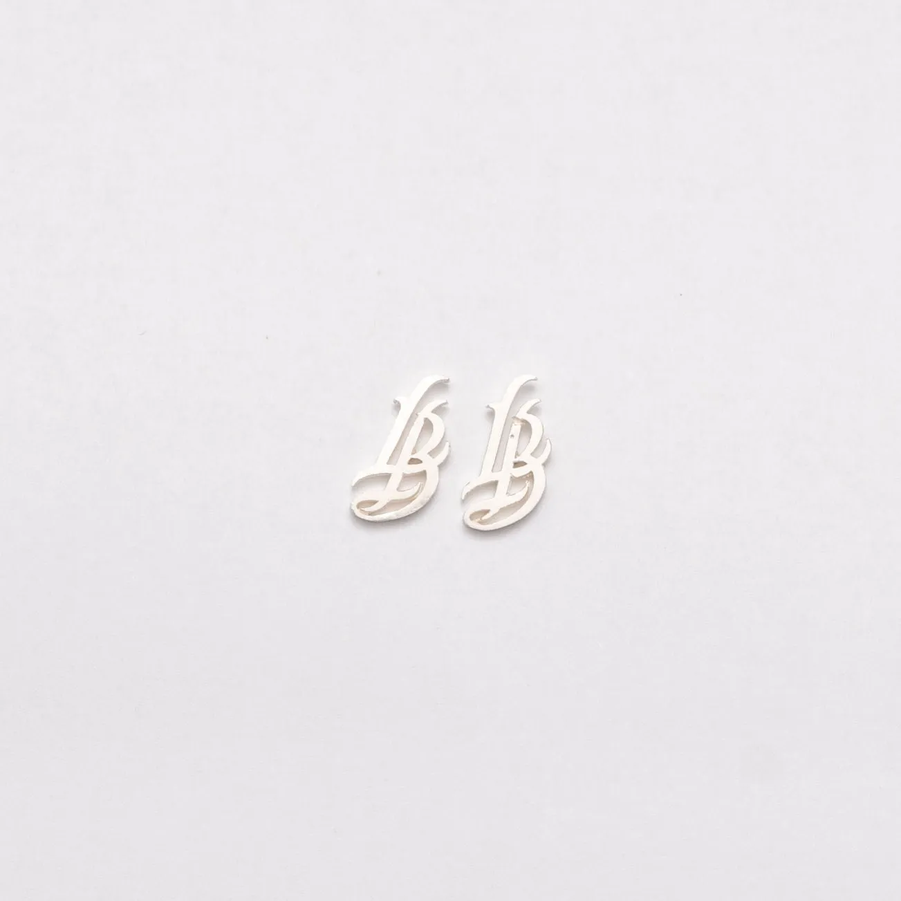 Cursive LB White Gold Plated Stud Earrings