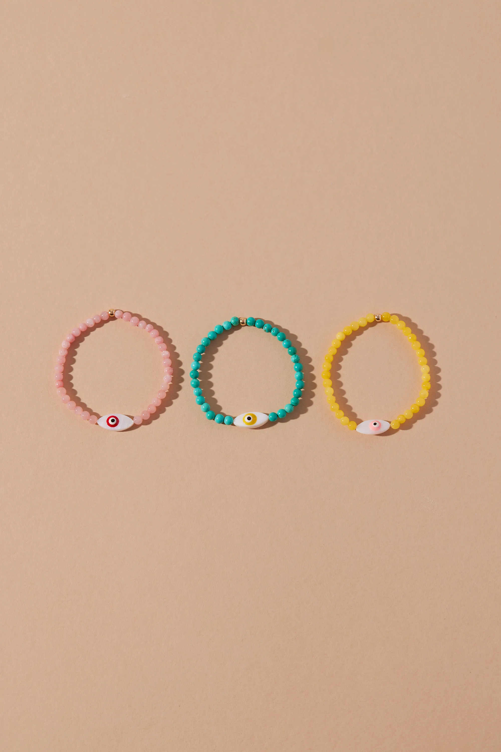 EXPRESS GOOD VIBES EVIL EYE BEADED BRACELET- YELLOW BEADS AND PINK EYE