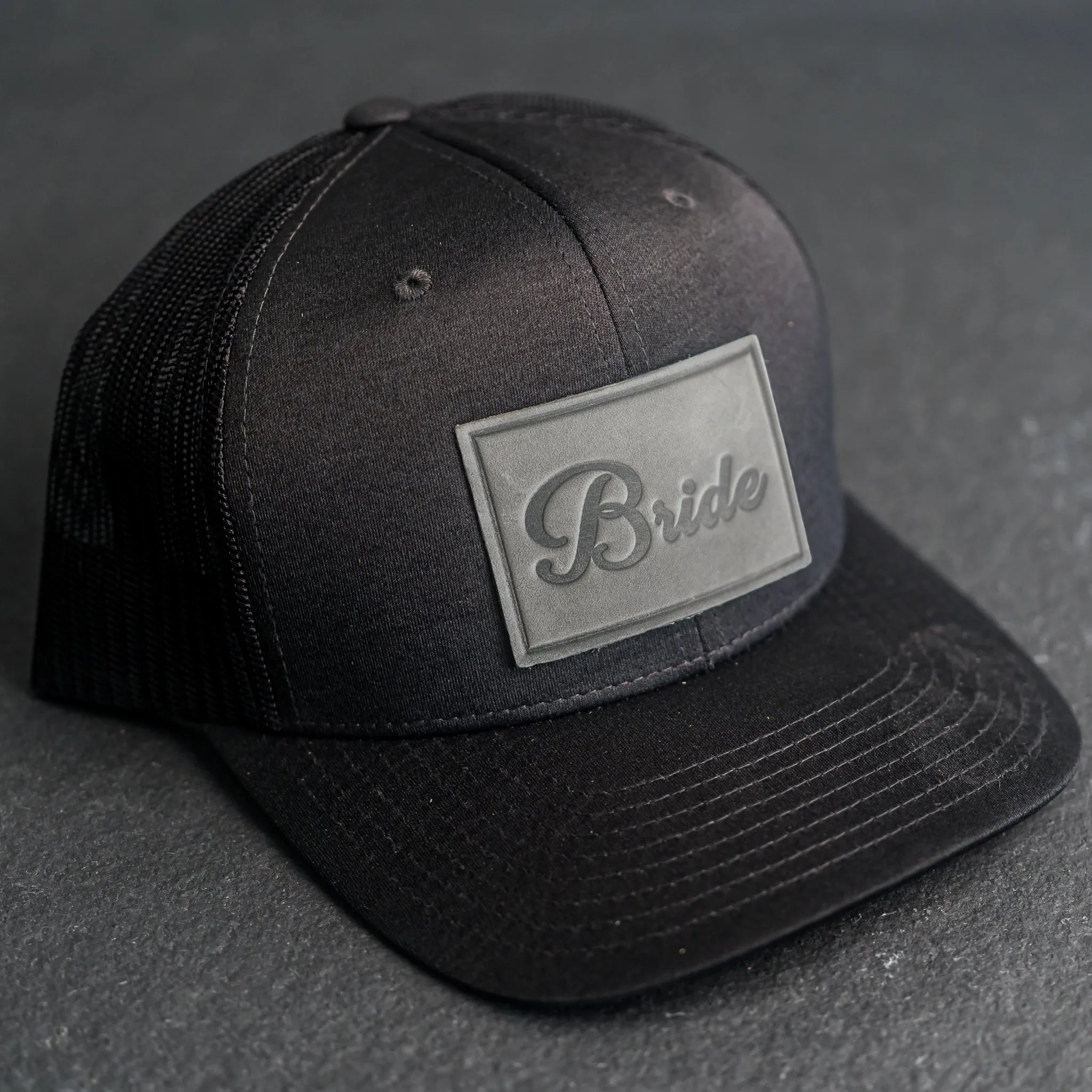 Leather Patch Performance Style Trucker Hat - Bride and Groom Stamp (cursive)