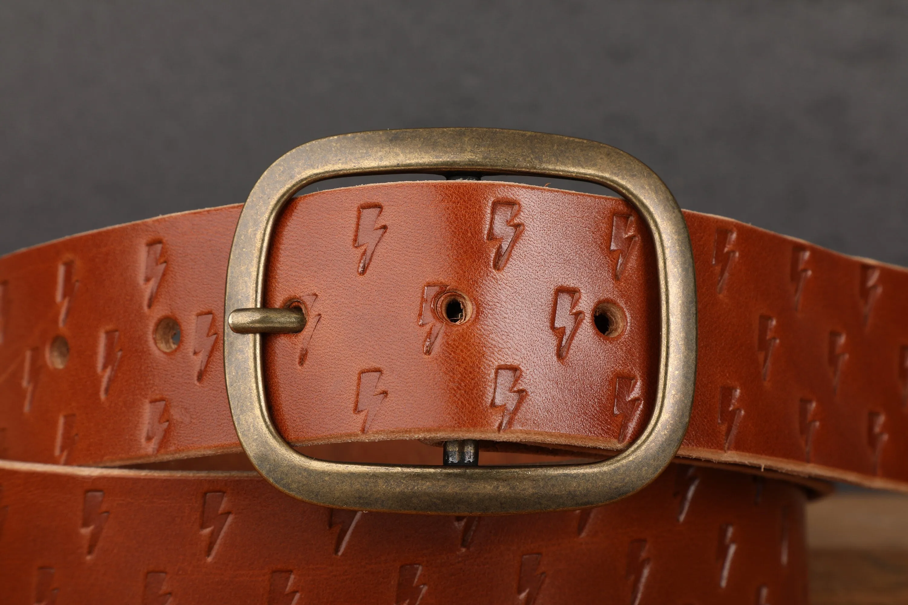 Medium Brown Bridle Leather Belt with Embossed Lightning Bolts and Antique Brass Buckle