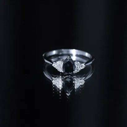 Pear Shaped Black Diamond and Diamond Solitaire Trio Ring