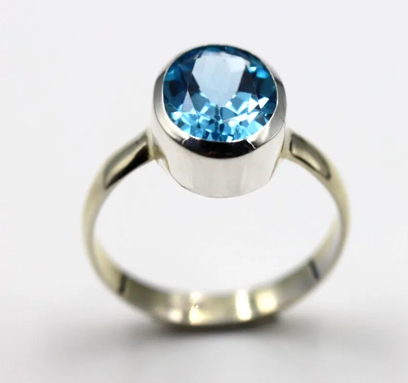 Size N / 6.5 Genuine Sterling Silver Blue Topaz Oval Ring