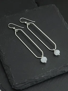 Sterling silver oval hoops with moonstone gemstones